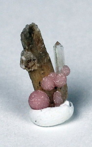 Rhodocrosite spheres and quartz scepter