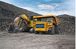 Picture of a large mining truck and an excavator