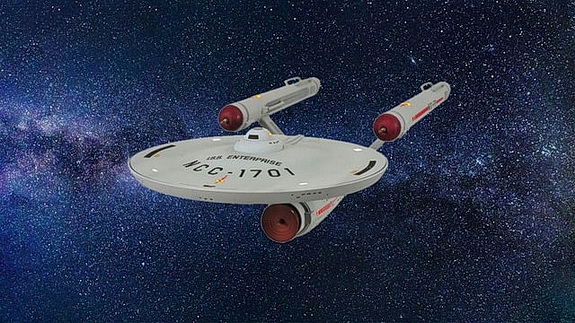 Star Ship Enterprise from the original Star Trek series with stars in the background