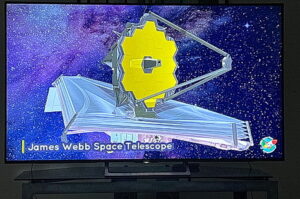 Photo of LCD screen showing the James Web Telescope