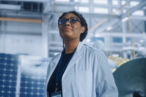Woman scientist lookiing up